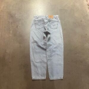 Vintage Levi's 560 orange tab men's light wash jeans paper tag‎ 1997